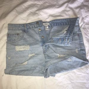 High waisted, light wash denim shorts.